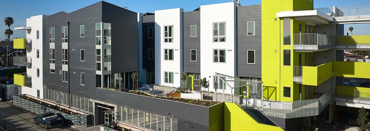 Luxury balcony with stunning sagebrush view and mountain backdrop at Lah Monarch.